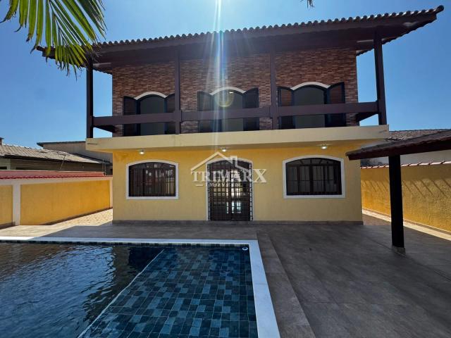 Casa no bairro Parque Augustus, em Itanhaém, lado praia, a 100 metros do mar, em rua pavimentada. Imóvel com 409,69 m² de área total. — foto 4