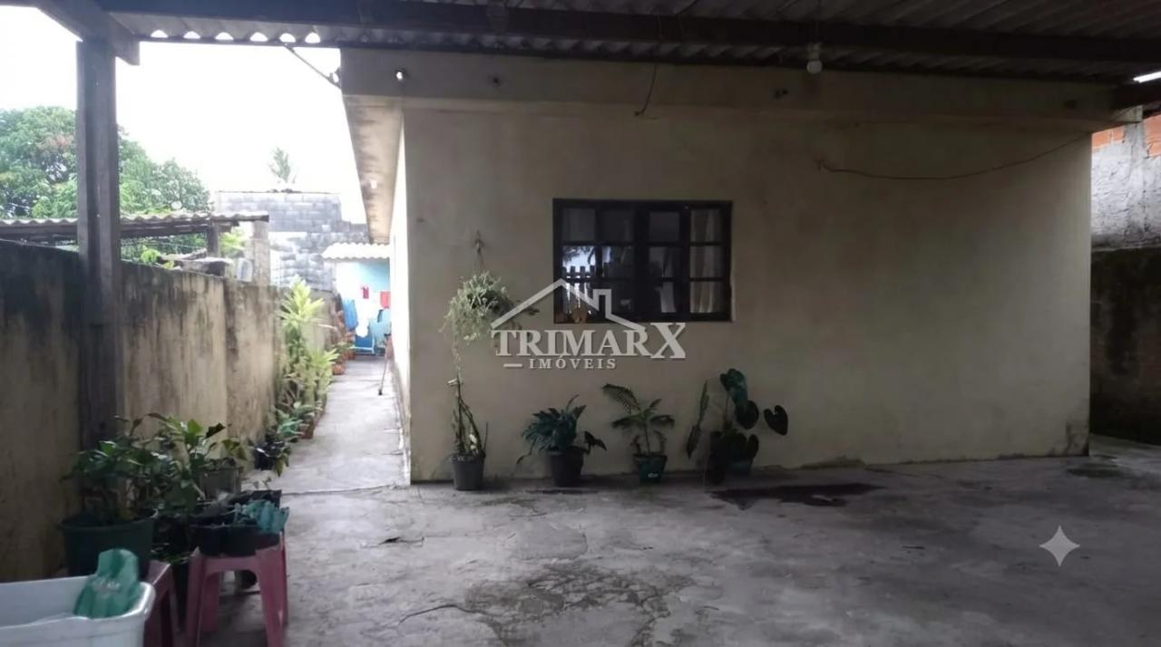Casa no bairro Savoy, em Itanhaém, lado serra, a 600 metros da rodovia, em rua pavimentada. Imóvel com 135,50 m² de área total,. — foto 1