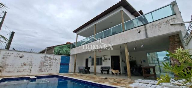 Casa no bairro Nova Peruíbe, em Peruibe, lado praia, a 1000 metros do mar, em rua pavimentada. Imóvel com 336 m² de área total. — foto 2