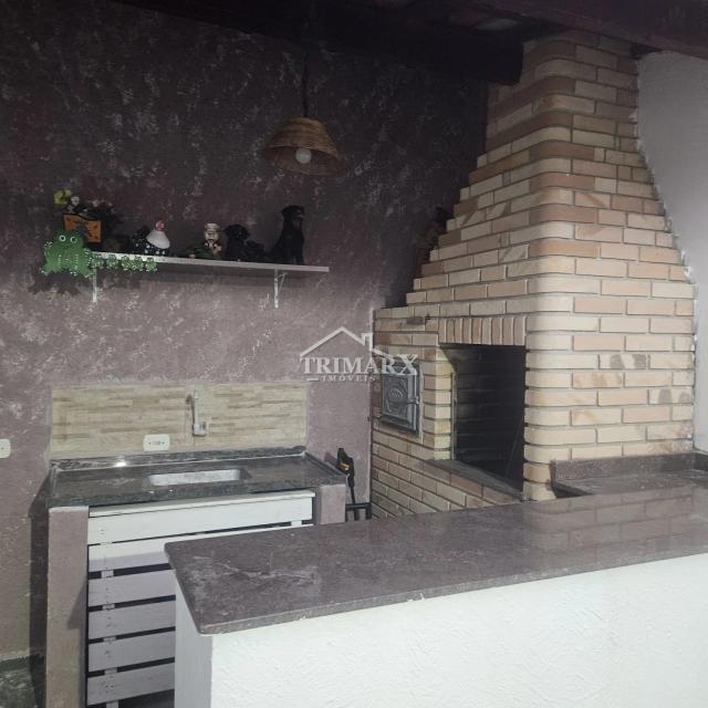Casa no bairro Nova Peruíbe, em Peruíbe, no litoral sul de São Paulo, em rua pavimentada. lado praia, a 1,2 km do mar. Imóvel com 125 m² de área total. — foto 5