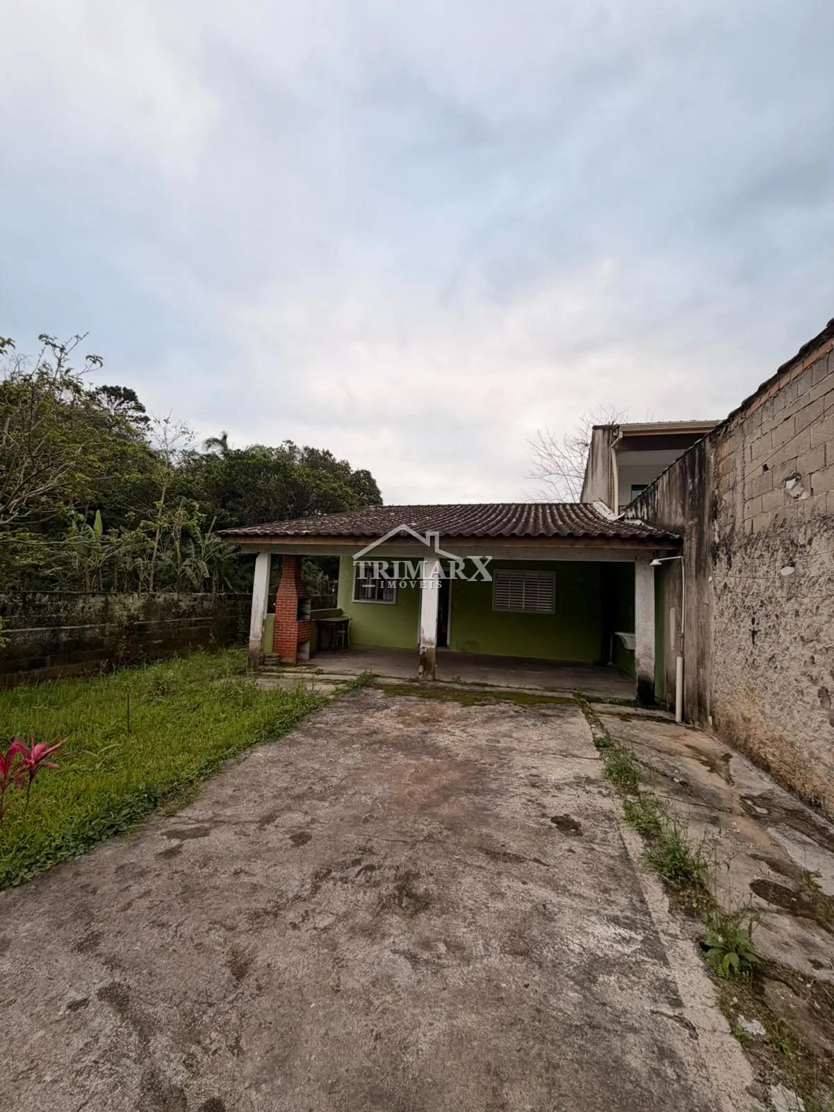 Casa no bairro Jardim dos Prados, em Peruibe, lado serra, a 1500 metros da rodovia, em rua pavimentada. Imóvel com 295,83 m² de área total — foto 1
