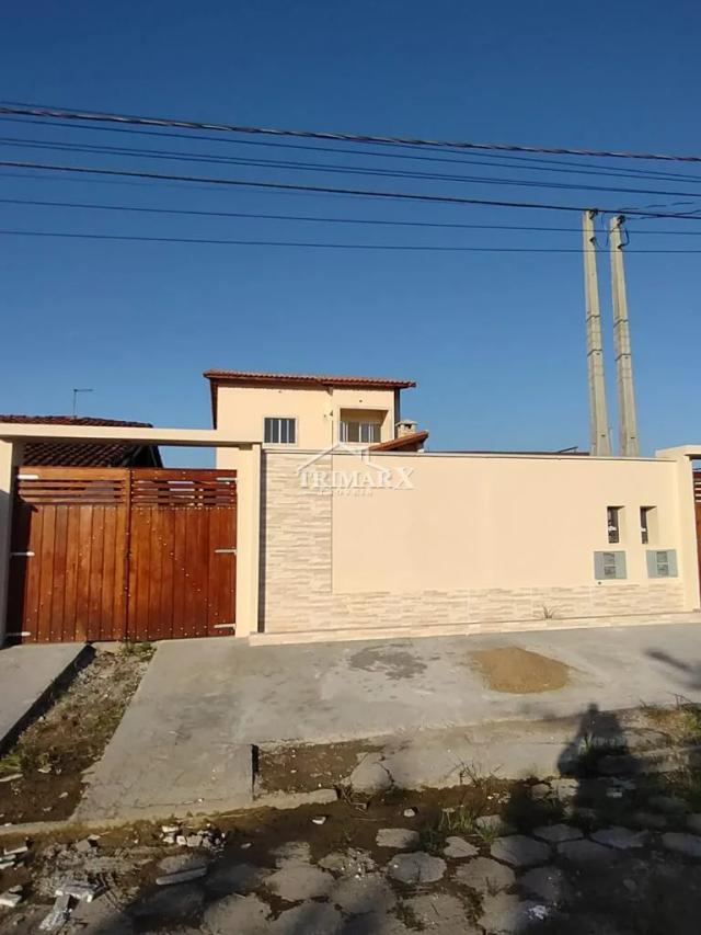Casa sobreposta alta no bairro Bopiranga, em Itanhaém, litoral sul de São Paulo, lado praia, a 600 metros do mar, em rua pavimentada. Imóvel possui 70,65 m² de área util. — foto 3