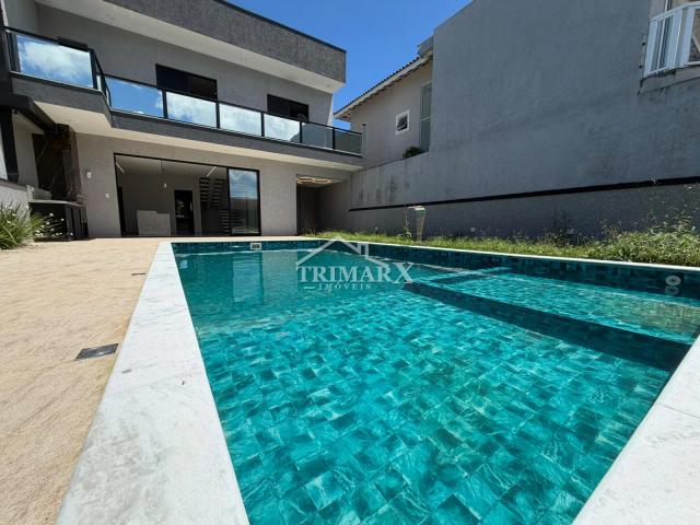 Casa no bairro Oásis, em Peruíbe, no litoral sul de São Paulo, lado praia, a 900 metros do mar, em rua pavimentada. Imóvel com 360 m² de área total. — foto 2
