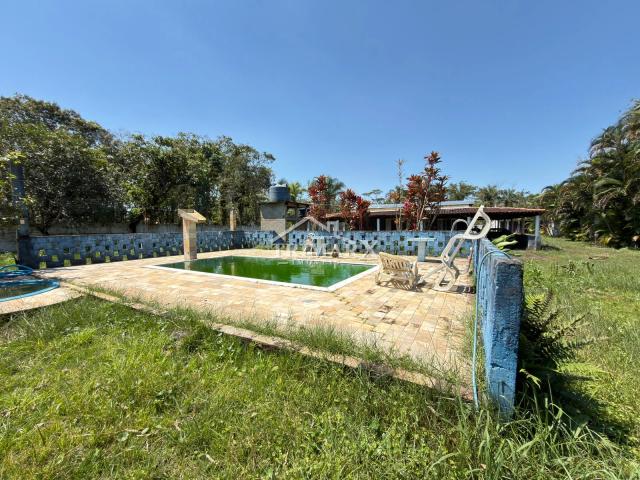 Chácara no bairro Armando Cunha, em Peruíbe, a 5,000 metros da rodovia, em rua de terra. Imóvel com 5,000 m² de área total. — foto 4