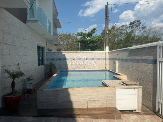 Casa no Stella Maris em Peruíbe, lado praia, a 1 km do mar , em rua pavimentada. Imóvel com 174 m² de área total — foto 2