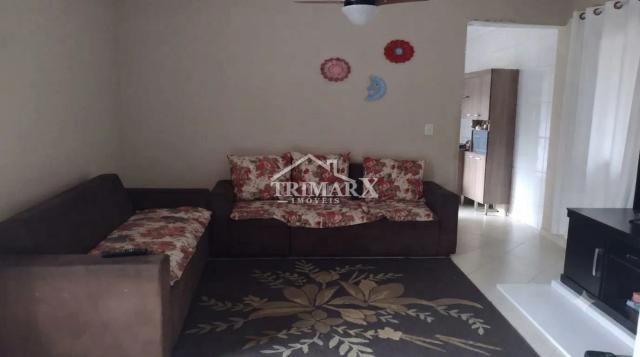 Casa no bairro Savoy, em Itanhaém, lado serra, a 600 metros da rodovia, em rua pavimentada. Imóvel com 135,50 m² de área total,. — foto 3