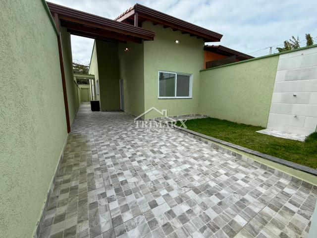 Casa no bairro Nova Peruíbe, em Peruíbe, lado praia, 1.200 metros do mar, em rua pavimentada. Imóvel com 150 m² de área total. — foto 2