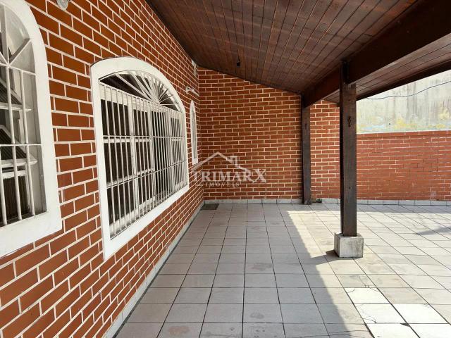 Casa no bairro Balneário Continental, em Peruíbe, no litoral sul de São Paulo, em rua pavimentada. Imóvel com 250 m² de área total. — foto 2