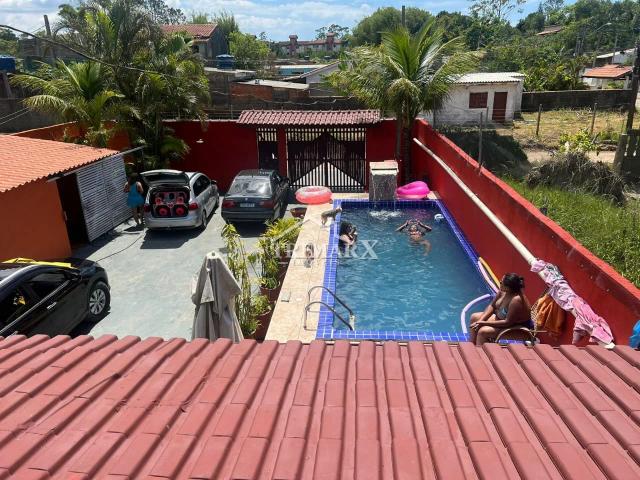 Casa no Jardim Umuruama, em Itanhaém, lado serra, a 800 metros da rodovia, em rua de terra. Imóvel com 330,70 m² de área total — foto 3