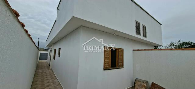 Casa no bairro Estância São José, em Peruíbe, no litoral sul de São Paulo, lado praia, pós linha, a 1000 metros do mar, em rua pavimentada. Imóvel com 140 m² de área total. — foto 4