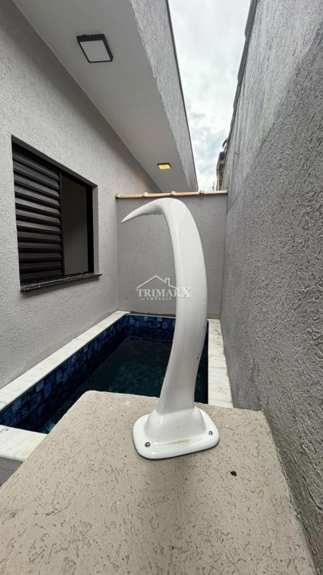 Casa em condomínio, no bairro Belas Artes, em Itanhaém, no litoral sul de São Paulo, lado praia, a 1,5 km do mar, em rua pavimentada. Imóvel com 168 m² de área total. — foto 4