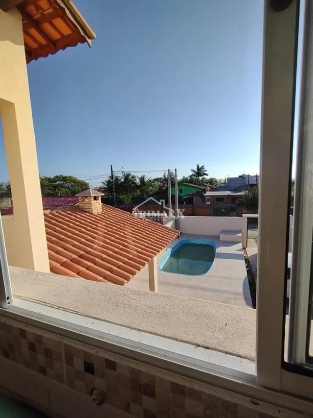 Casa sobreposta alta no bairro Bopiranga, em Itanhaém, litoral sul de São Paulo, lado praia, a 600 metros do mar, em rua pavimentada. Imóvel possui 70,65 m² de área util. — foto 5