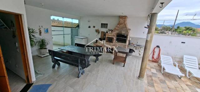 Casa no bairro Nova Peruíbe, em Peruibe, lado praia, a 1000 metros do mar, em rua pavimentada. Imóvel com 336 m² de área total. — foto 5