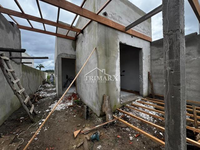 Casa no bairro Estância dos Eucaliptos, em Peruíbe, no litoral sul de São Paulo, lado serra, a 1000 metros do mar, em rua pavimentada. Imóvel com 180 m² de área total — foto 2