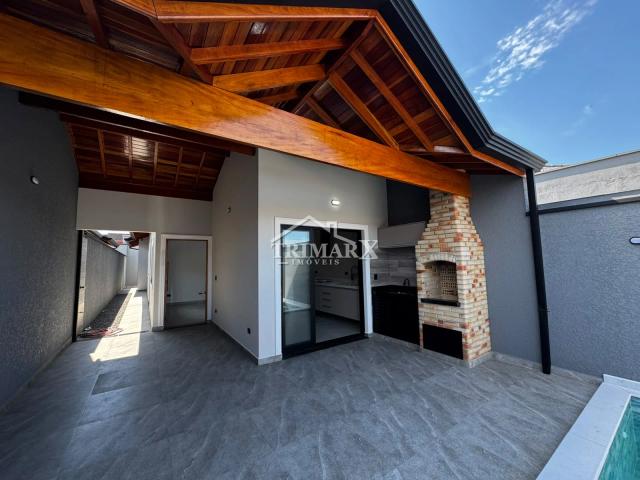 Casa no bairro Residencial Park D'aville, em Peruíbe, no litoral sul de São Paulo, lado praia, a 2.2 km metros do mar, em rua pavimentada. Imóvel com 180 m² de área total. — foto 2