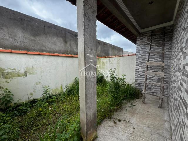 Casa no bairro Estância Santa Izabel, em Peruíbe, no litoral sul de São Paulo, lado serra, a 1000 metros do mar, em rua de terra. Imóvel com 125 m² de área total. — foto 4