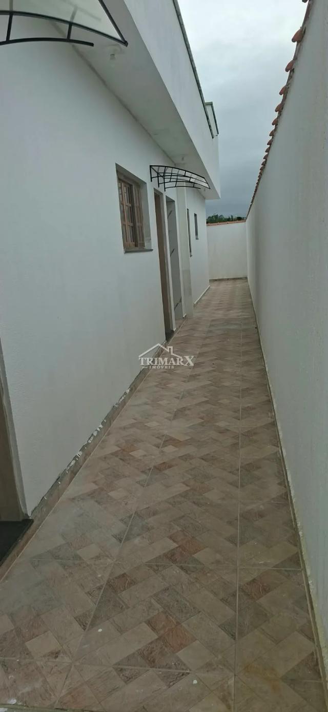 Casa no bairro Estância São José, em Peruíbe, no litoral sul de São Paulo, lado praia, pós linha, a 1000 metros do mar, em rua pavimentada. Imóvel com 140 m² de área total. — foto 5