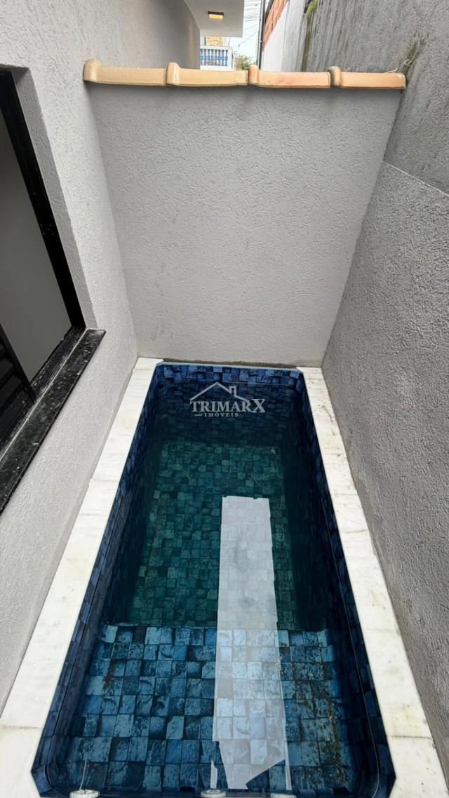 Casa em condomínio, no bairro Belas Artes, em Itanhaém, no litoral sul de São Paulo, lado praia, a 1,5 km do mar, em rua pavimentada. Imóvel com 168 m² de área total. — foto 3