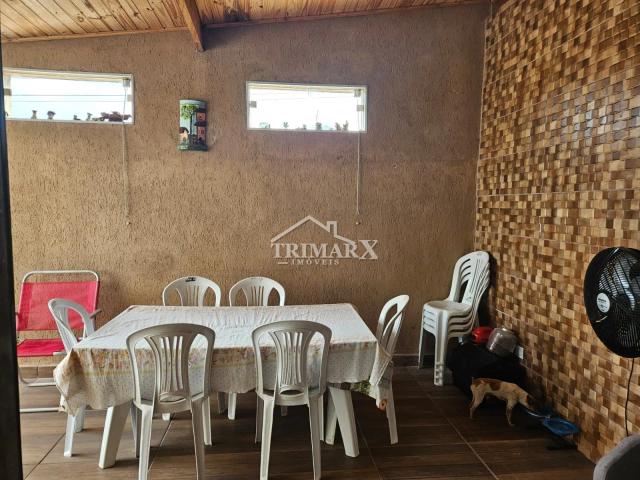 Casa no bairro Nova Peruíbe, em Peruíbe, no litoral sul de São Paulo, em rua pavimentada. lado praia, a 1,2 km do mar. Imóvel com 125 m² de área total. — foto 4