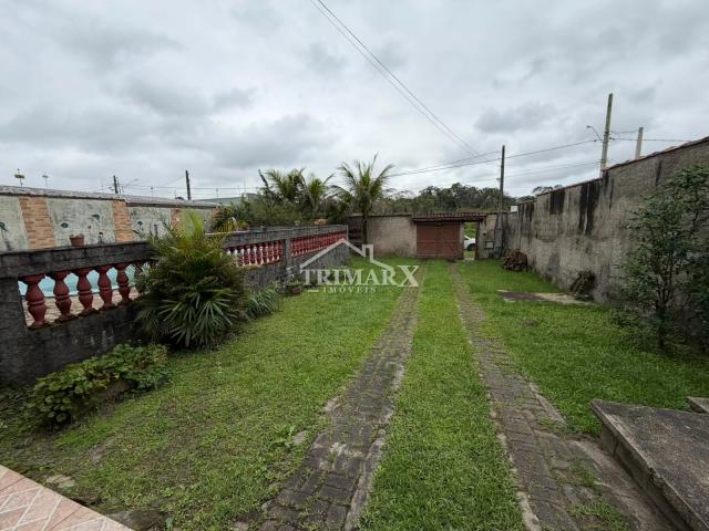 Casa no bairro Jardim Coronel, em Itanhaém, no litoral sul de São Paulo, lado serra,  a 2,5 km da rodovia e a 4 km do mar, em rua pavimentada. Imóvel com 570 m² de área total,. — foto 4