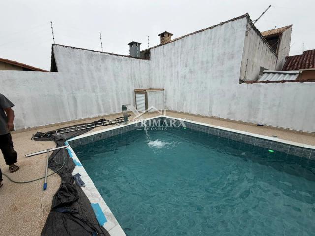 Casa no bairro Josedy, em Peruíbe, lado praia, a 800 metros do mar, em rua pavimentada. Imóvel com 250 m² de área tota.