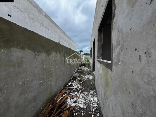 Casa no bairro Estância dos Eucaliptos, em Peruíbe, no litoral sul de São Paulo, lado serra, a 1000 metros do mar, em rua pavimentada. Imóvel com 180 m² de área total — foto 3