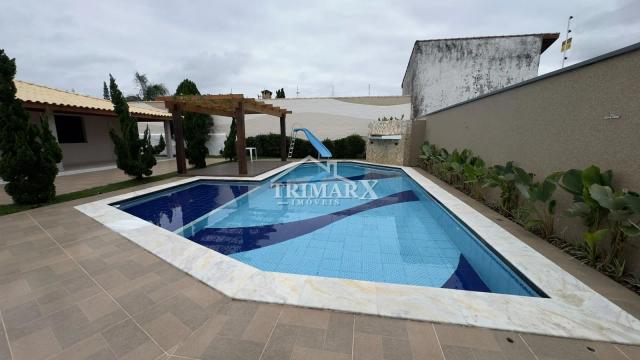 Casa no bairro Oasis, em Peruíbe, no litoral sul de São Paulo, lado praia, a 800 metros do mar, em rua pavimentada. Imóvel com 790 m² de área total. — foto 5