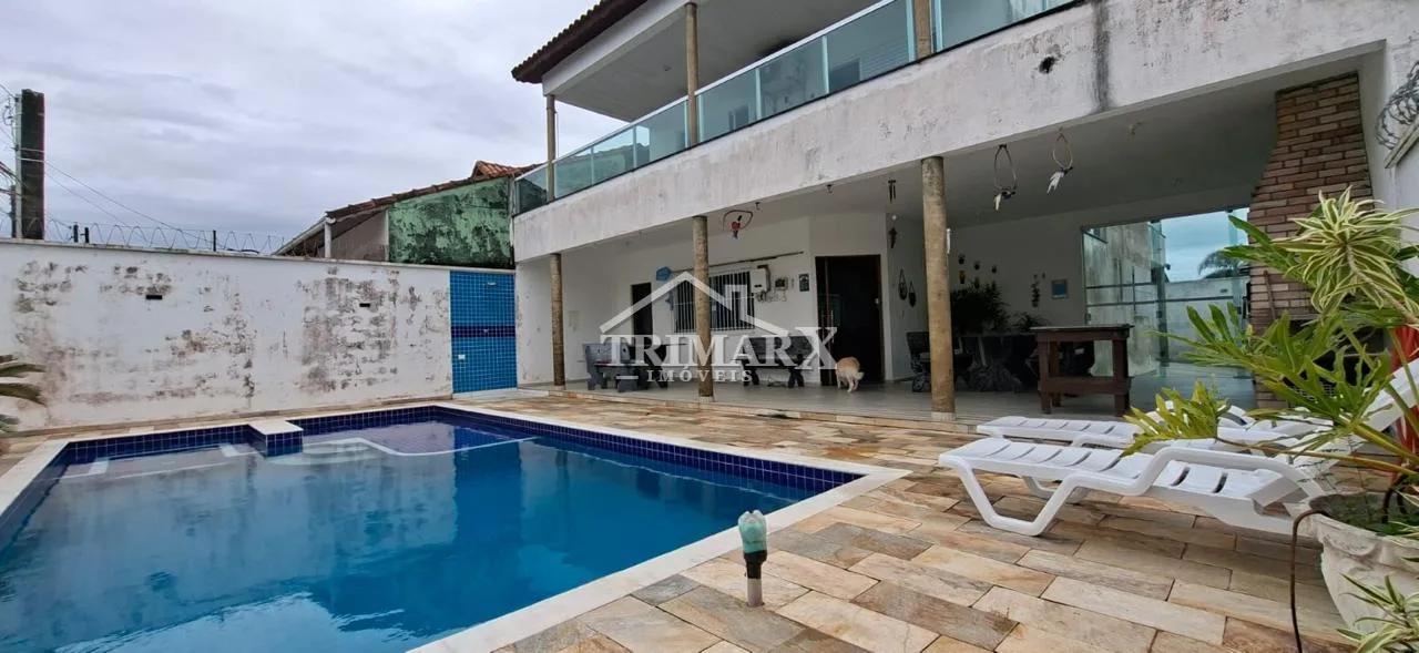 Casa no bairro Nova Peruíbe, em Peruibe, lado praia, a 1000 metros do mar, em rua pavimentada. Imóvel com 336 m² de área total. — foto 1