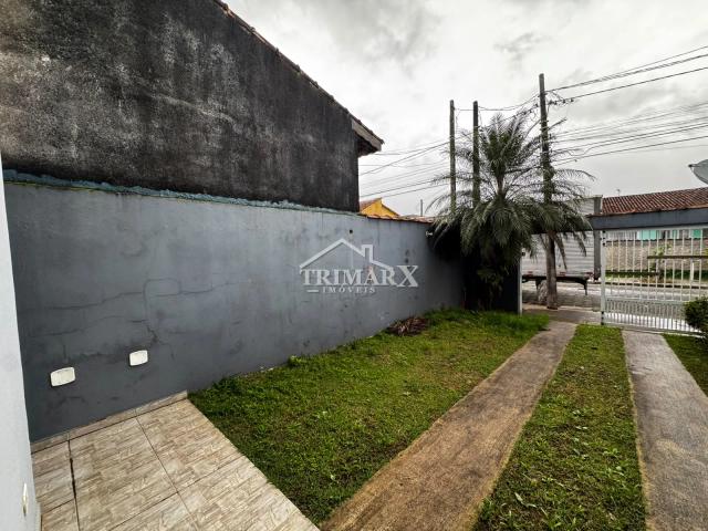 Casa no bairro Jardim Peruíbe, em Peruíbe, lado praia, à 1,700 metros do mar , em rua pavimentada. Imóvel com 150 m² de área total. — foto 2