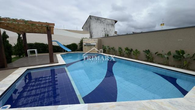 Casa no bairro Oasis, em Peruíbe, no litoral sul de São Paulo, lado praia, a 800 metros do mar, em rua pavimentada. Imóvel com 790 m² de área total. — foto 4