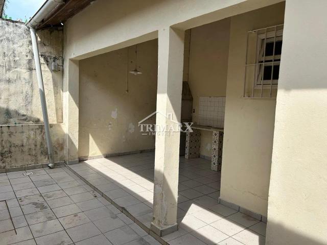 Casa no bairro Balneário Continental, em Peruíbe, no litoral sul de São Paulo, em rua pavimentada. Imóvel com 250 m² de área total. — foto 5