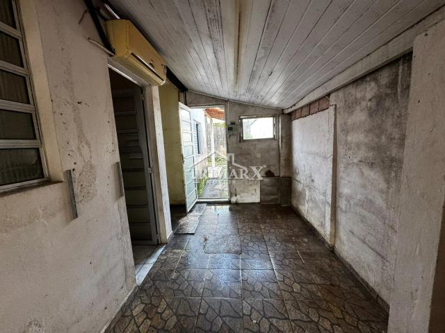 Casa no bairro Jardim das Flores, em Peruibe, lado praia, a 2,5 km do mar, em rua pavimentada. Imóvel com 162 m² de área total — foto 2