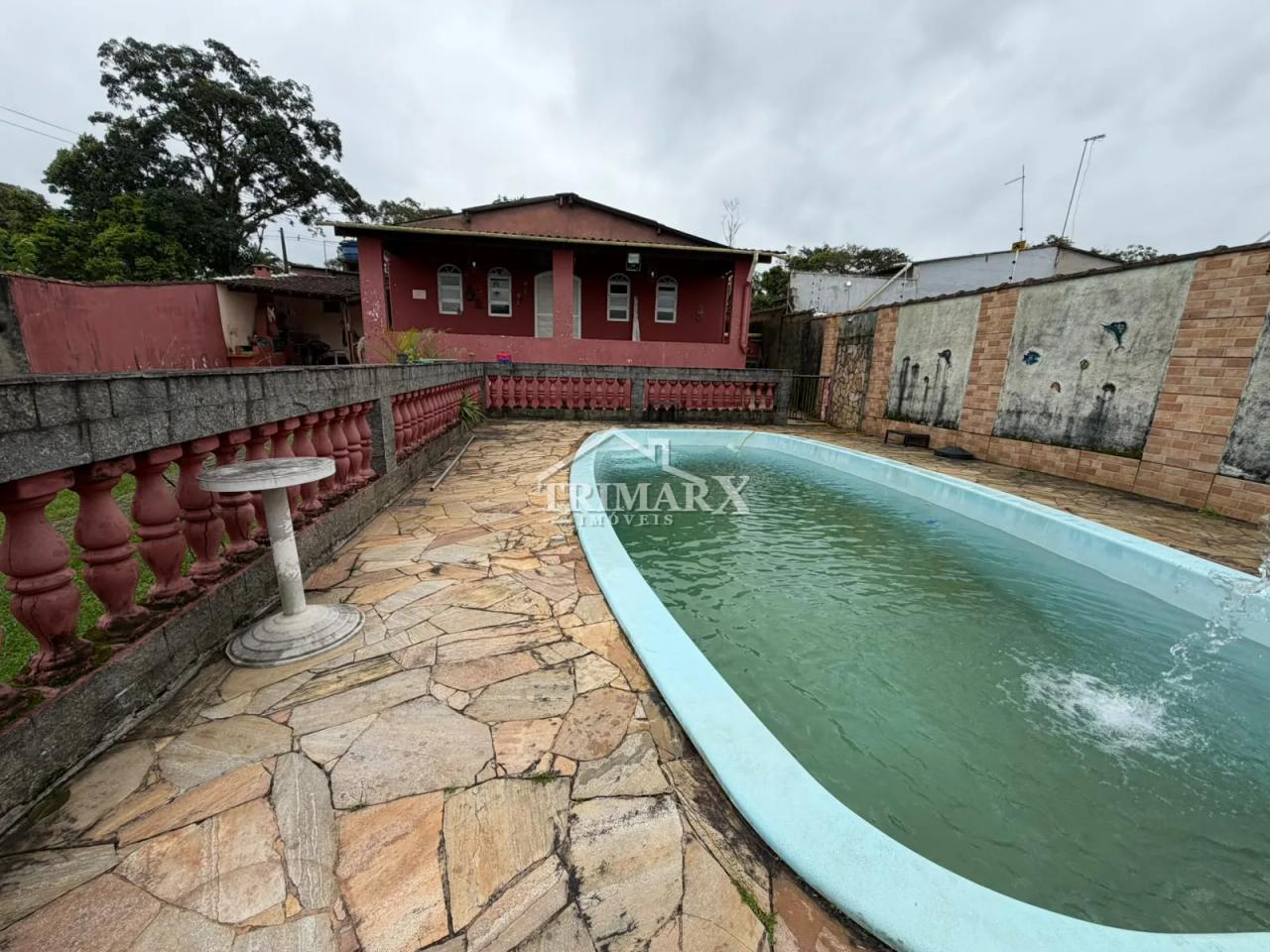 Casa no bairro Jardim Coronel, em Itanhaém, no litoral sul de São Paulo, lado serra,  a 2,5 km da rodovia e a 4 km do mar, em rua pavimentada. Imóvel com 570 m² de área total,. — foto 1
